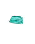 Baguette cut loose natural Colombian emerald, upside down pavilion view