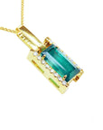 The right side profile view of a yellow gold emerald baguette pendant.