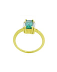 Baguette cut emerald and diamond ring in 18k yellow gold, side top, gallery and band profile view.