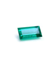1.62 ct. GIA F1 natural Muzo emerald, baguette cut, vibrant green, loose gemstone.