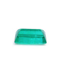 1.62 ct. baguette-cut natural emerald with vibrant green color and clear facets.