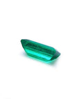 1.10 ct. baguette cut loose Colombian emerald with vibrant green color and lively brilliance.