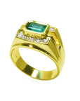 14K yellow gold men's ring with a 1.21 ct. emerald in an east-west bezel setting and diamond accents.