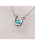 May's birthstone emerald horseshoe necklace for women in 14k white gold, a lucky piece to wear every day