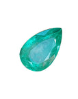 Big loose natural emerald pear cut from Colombia right side table and crown view