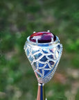 Men's black Ethiopian opal ring in 925 sterling silver with red-orange and blue hues.