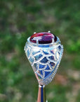 Men's black Ethiopian opal ring in 925 sterling silver with red-orange and blue hues.