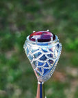 Men's black Ethiopian opal ring in 925 sterling silver with red-orange and blue hues.