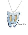 Back view of a natural blue agate butterfly pendant necklace with a sterling silver frame.