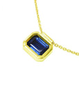 1.01 ct blue sapphire choker in a bezel setting on a 14K gold cable chain.