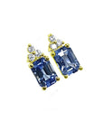14K yellow gold earrings with rectangular medium-light blue sapphires and sparkling diamond accents.