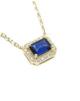 Natural blue sapphire necklace emerald cut, the vibrant sapphire is encircled by natural diamonds set in 14k yellow gold.