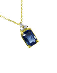Gold necklace with a natural blue sapphire pendant emerald cut in 14k.