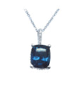 Cushion-cut blue sapphire necklace with a slider pendant, set in a four-prong basket setting of 14k white gold.