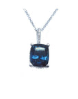 Cushion-cut blue sapphire necklace with a slider pendant, set in a four-prong basket setting of 14k white gold.