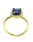 14k yellow gold ring with a rectangular emerald cut blue sapphire and diamond halo.