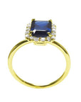 14k yellow gold ring with a rectangular emerald cut blue sapphire and diamond halo.
