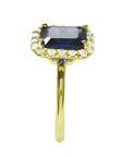 Women's 14k yellow gold ring with emerald-cut natural blue sapphire and diamond halo.