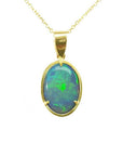 Oval bluish-green Australian opal pendant in 14K yellow gold with three prongs on a delicate chain.