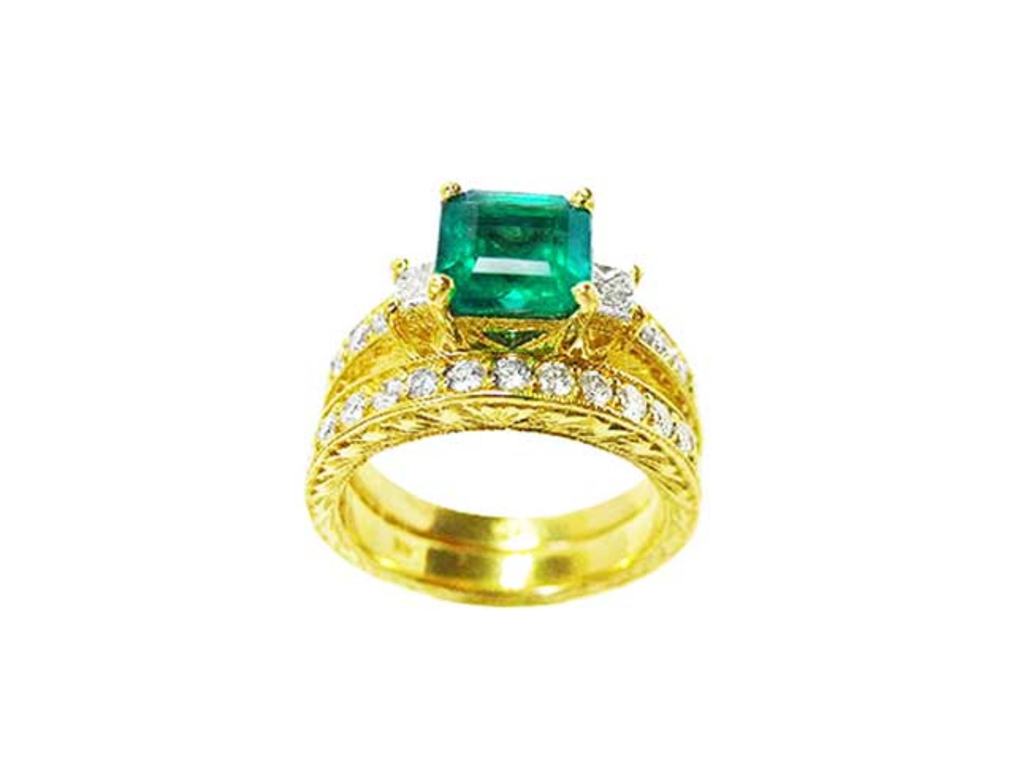 Gold ring with a natural emerald and diamonds wedding band match on a white background.