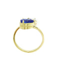 Two-stone "You and Me" blue natural sapphire and diamond bypass ring, this 1.20 ct. design celebrates dual elegance with its distinctive twisted-band silhouette.