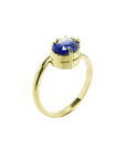 "You and Me" blue natural sapphire bypass ring side diamond handcrafted in 18k yellow gold with its distinctive twisted-band silhouette.