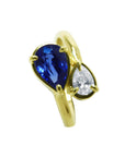 Two-stone "You and Me" blue natural sapphire bypass ring. This 1.20 ct. design celebrates dual elegance with its distinctive twisted-band silhouette.