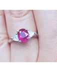 Women's 1.59 ct Burma Ruby ring with trillion side diamonds in 14k white gold.
