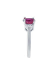 Women's 14k white gold ring with a deep red Burma ruby and trillion side diamonds.