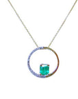 Necklace with a square natural emerald in a circle of life pendant gold and diamond.