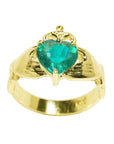 This emerald claddagh ring in yellow gold shows the heart topside profile gemstone and sideways.