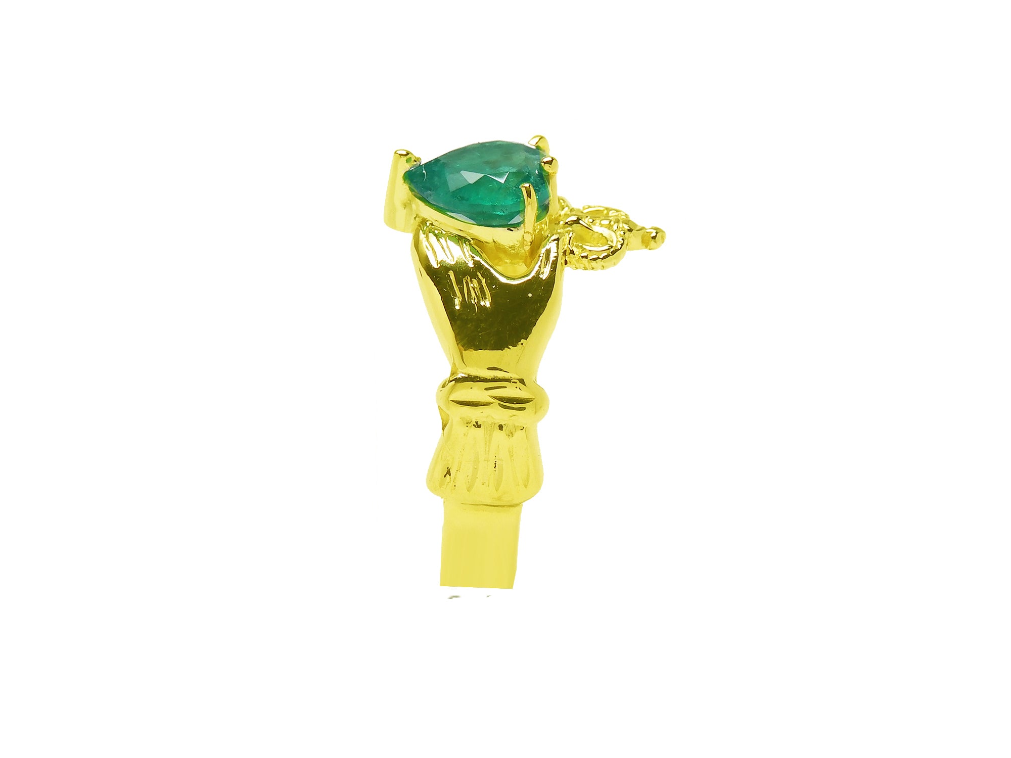 A 14k yellow gold claddagh emerald ring displaying its top emerald and band side profile.