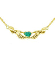 14K yellow gold Claddagh necklace with a deep green heart-cut emerald.