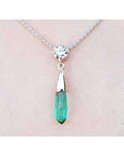 14k white gold emerald and diamond briolette necklace with a natural diamond on top slider bail and 18" inches chain