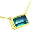 Women's emerald necklace solitaire style, Muzo Colombian origin east-west orientation handcrafted in 18k yellow gold