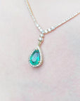close view of a genuine emerald necklace jewelry high quality pear cut natural sourced from the Colombian Muzo mine