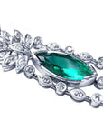 Very clos view of a marquise necklace 2.12 carats Colombian emerald and diamonds 14K white gold