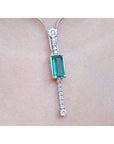 A closer sight of a emerald and diamond necklace elongated emerald-cut natural Muzo mines