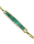 2.40 ct emerald and diamond 14K yellow gold bracelet with baguette-cut emeralds.