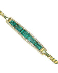 2.40 ct emerald and diamond 14K yellow gold bracelet with baguette-cut emeralds.