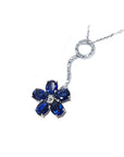 Left side of a cluster of natural sapphires pendant white gold necklace top view