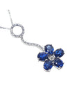 Right side top view of a cluster of natural sapphires pendant white gold necklace
