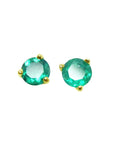 A pair of cocktail emerald stud earrings with a round cut design, set in 14K yellow gold.