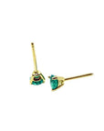 Medium deep natural emerald stud earrings in three-prong 14K yellow gold setting.
