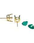 14K yellow gold prong basket earring settings with two bluish-green Colombian emeralds.
