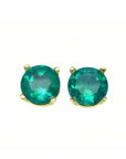 Pair of natural colombian emeralds round cut prong set earrings, made of 14k yellow gold.