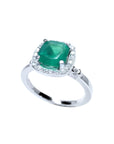 1.71 ct. Colombian emerald cushion cut halo diamond ring in 14K white gold.
