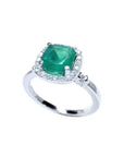 1.71 ct. Colombian emerald cushion cut halo diamond ring in 14K white gold.