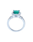 1.71 ct Colombian emerald cushion cut ring with diamond halo in 14K white gold.