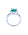 1.71 ct Colombian emerald cushion cut ring with diamond halo in 14K white gold.